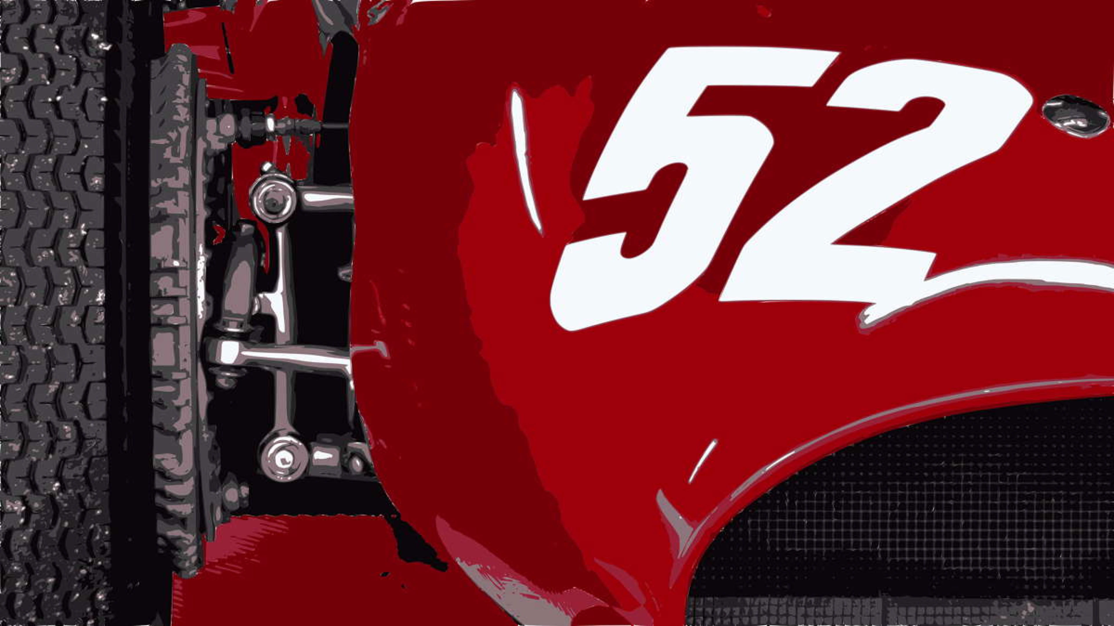 Close-up of a red race car with the number 52 in white on the side, showing part of the wheel and suspension.